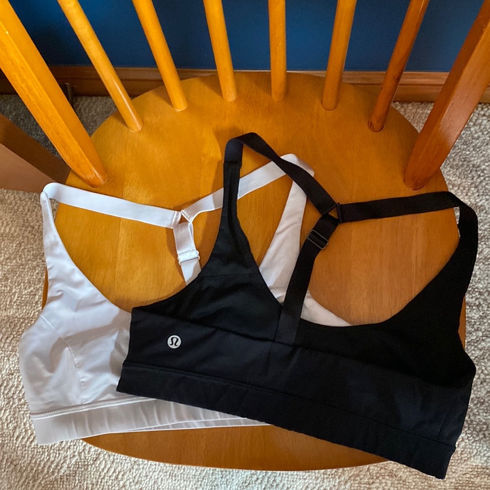 Two adjustable racer back sports bras light support. Size 8